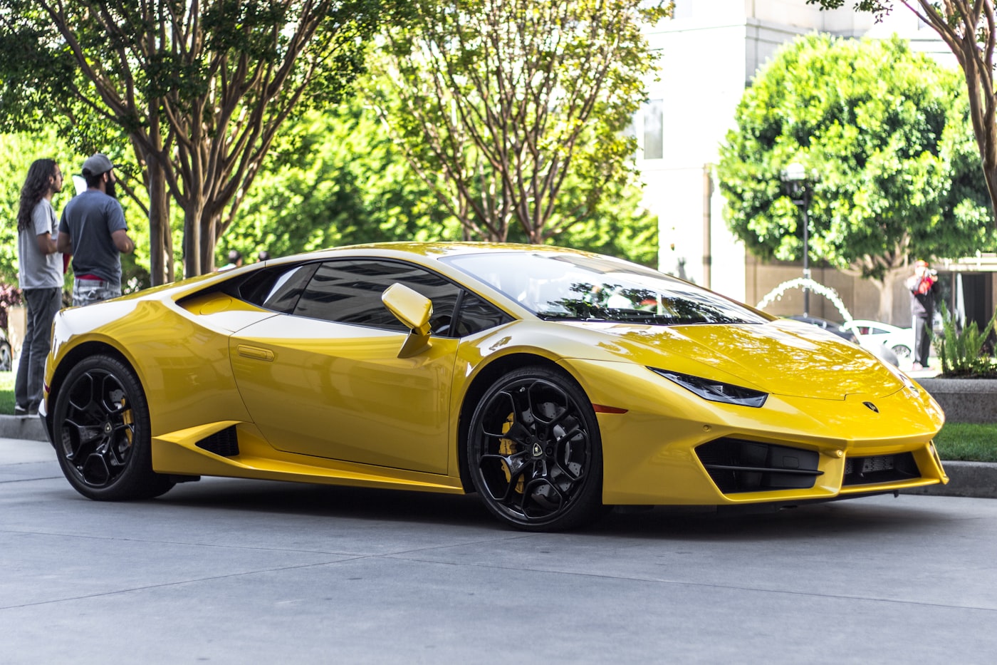 Luxury sports car handled by professional vehicle logistics team